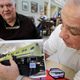 Two former NRO employees Fred Marra, left, and Bob Zarba describe the camera operation of the Hexagon KH-9 secret spy satellite, which was launched using the space shuttle, in a file photo from when the program was declassified in December 2011 (AP Photo/Kathy Willens)